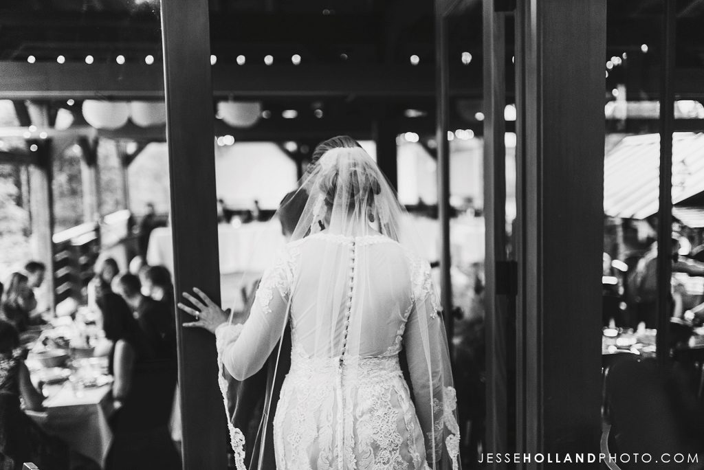 Bride walking through a doorway