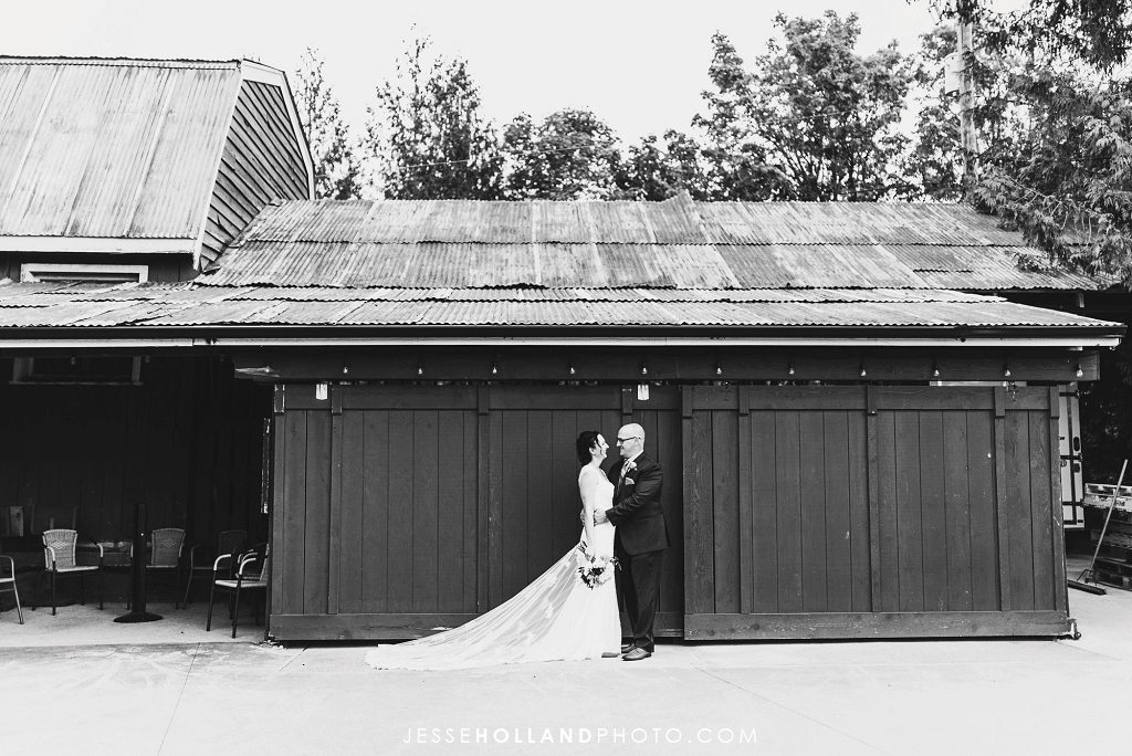 couple in front of barn