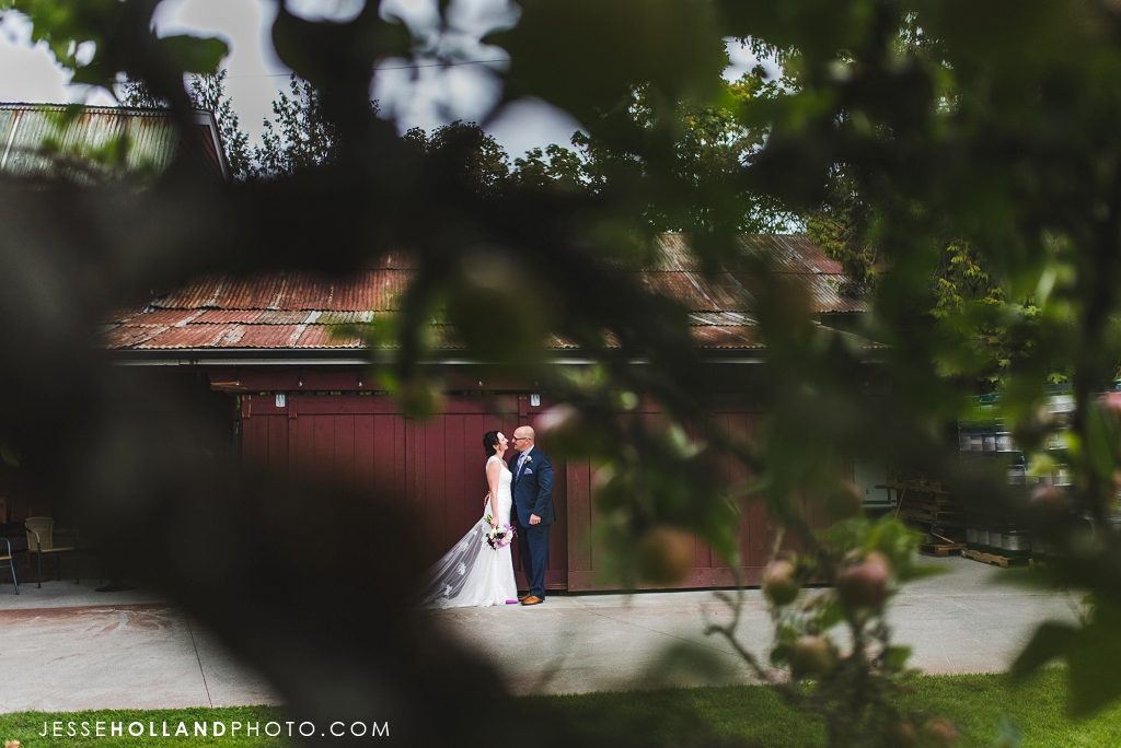 couple in front of barn